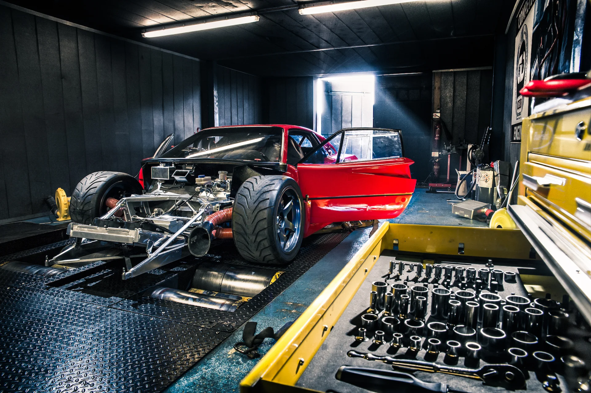 A Ferrari F40LM GTE on a rolling road about to be tested up to 720BHP