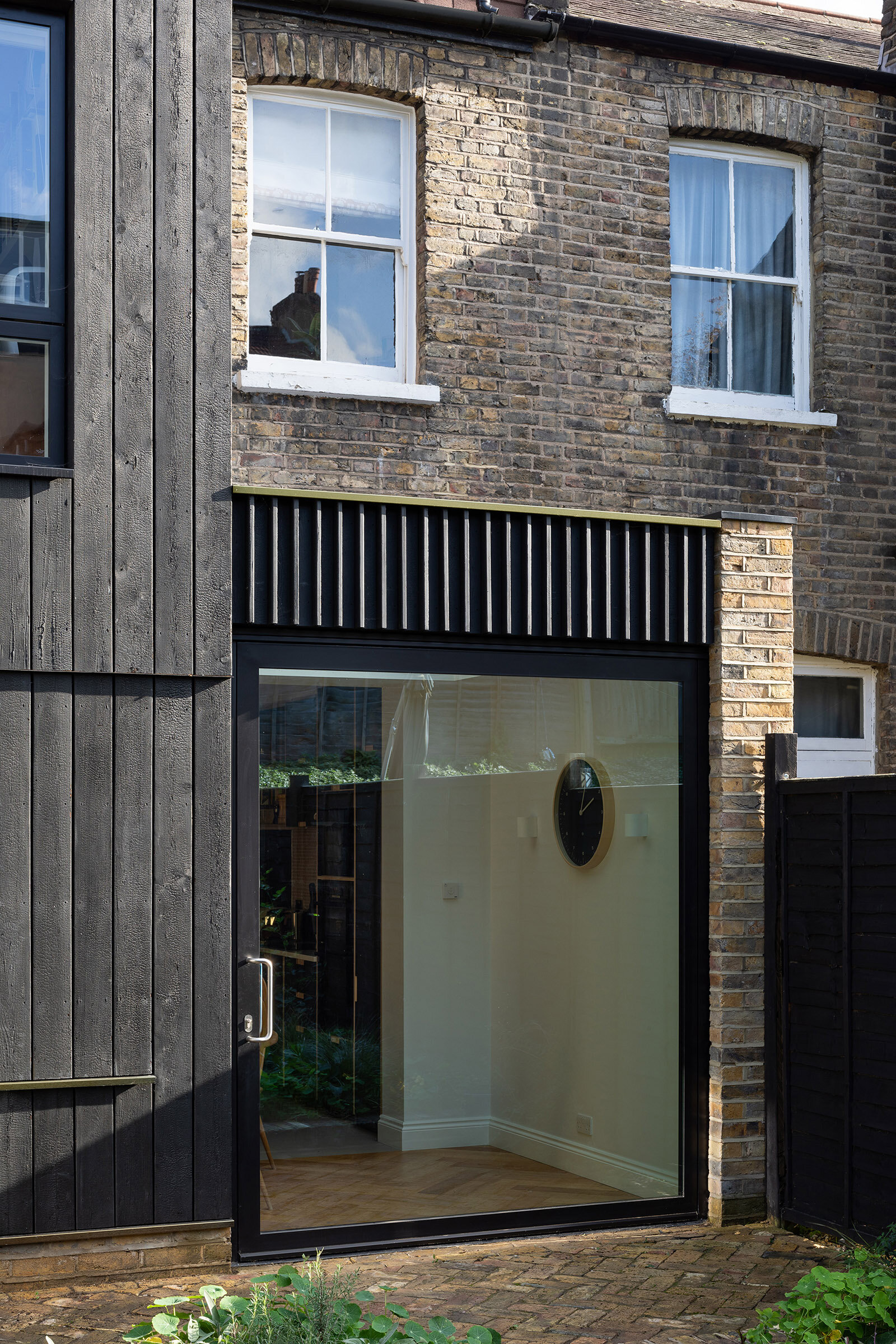 03-charred-house-victorian-terrace-extension-rear-elevation-architecture-ladywell-lewisham-london-uk-rider-stirland-architects.jpg