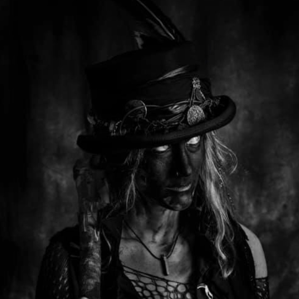 Petra Von Büstenhalter: Other-worldly sprite and ethereal being; while no one place can lay claim to her, she appears out of the mists to weave her Dartmoor dance magicks with us, imbibe the nectar of the Disar, and vanish again.