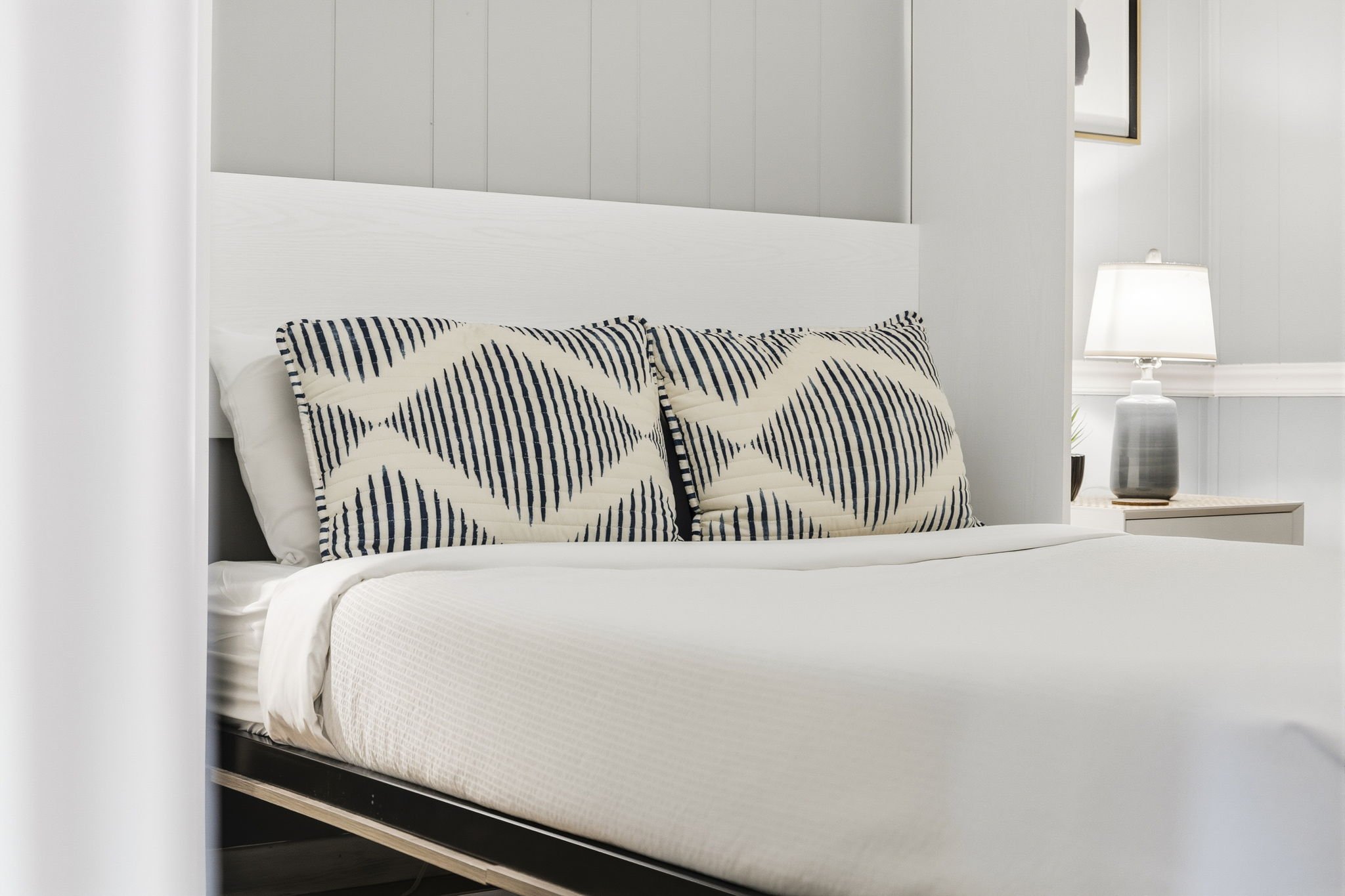 I slept so well here — soft linens, calming coastal touches, and a quiet space that instantly felt relaxing after long days in the sun.
