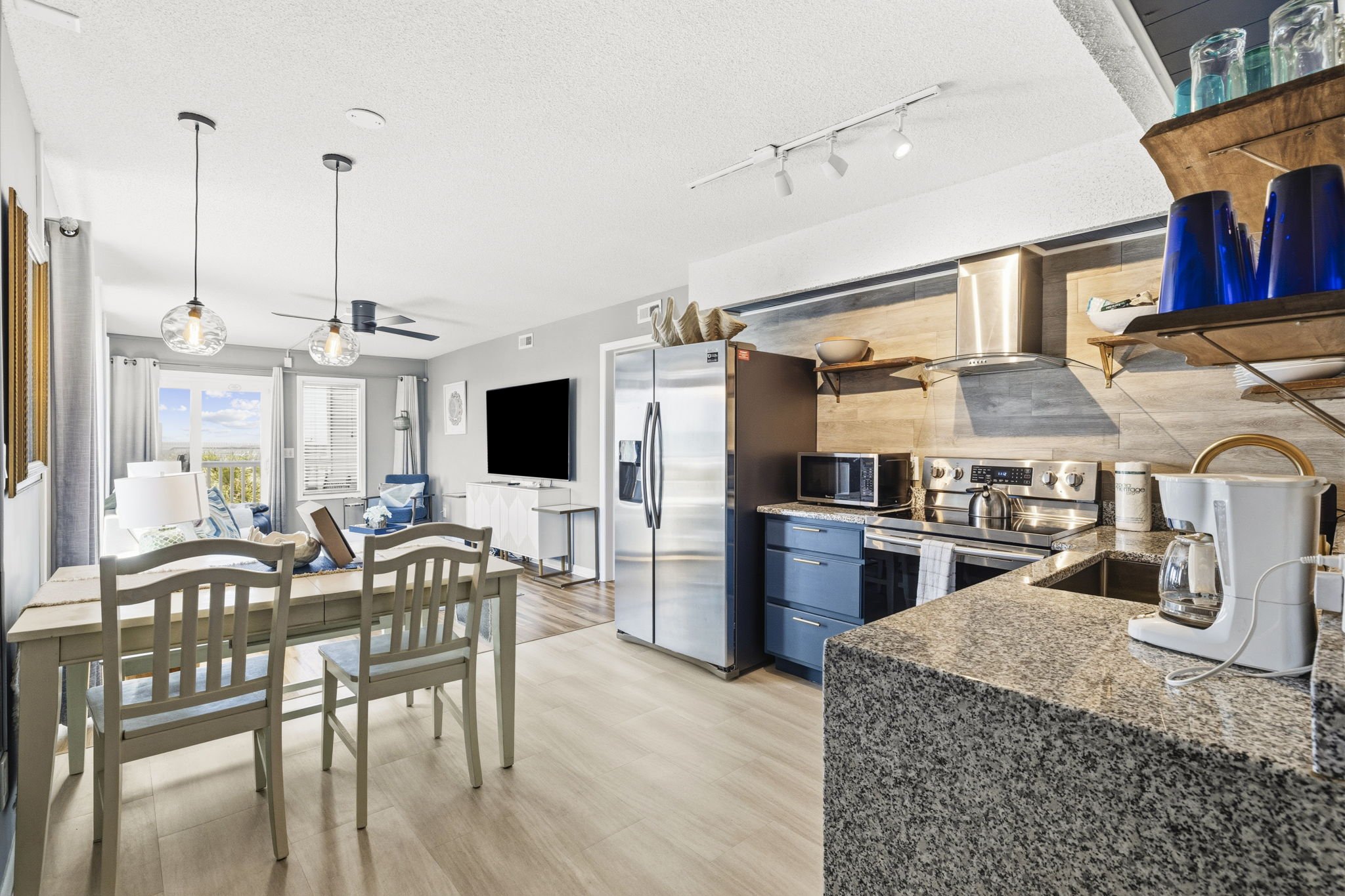 Fully stocked kitchen and dining area! If you want to eat in, it's the perfect space to cook and enjoy your meals.