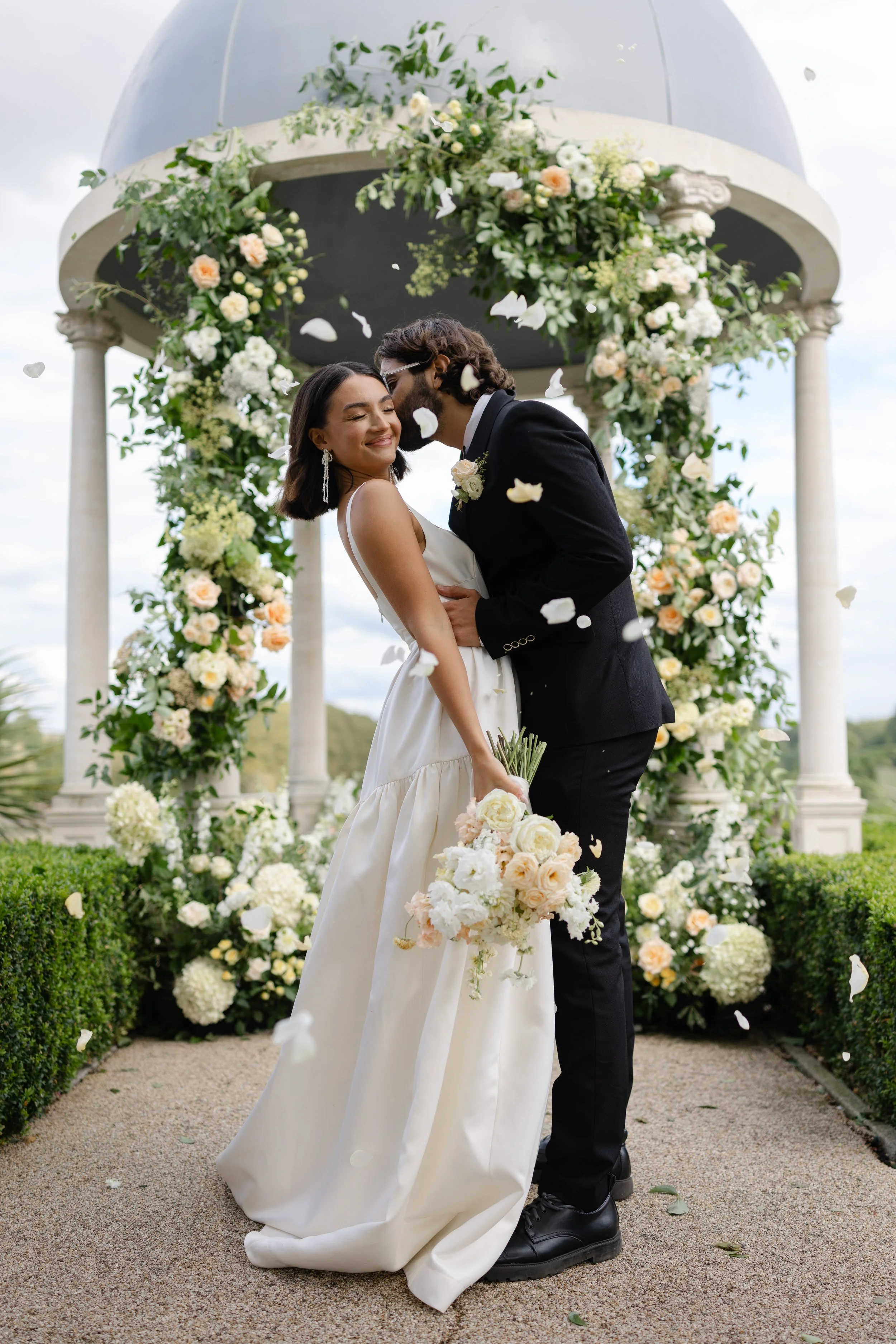 Wedding in front of dome at Froyle Park in Hampshire