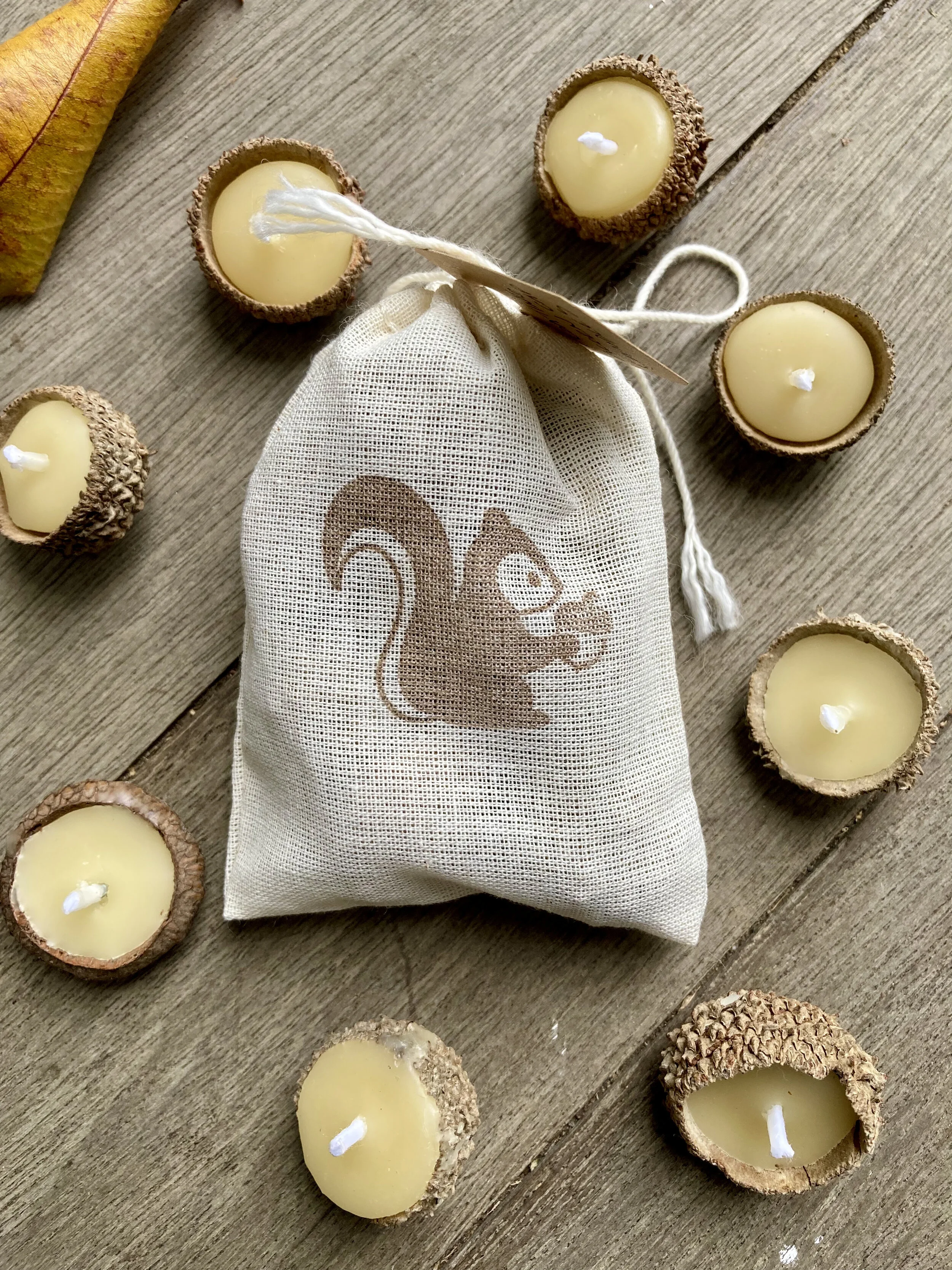 Floating Acorn Cap Candles, $12