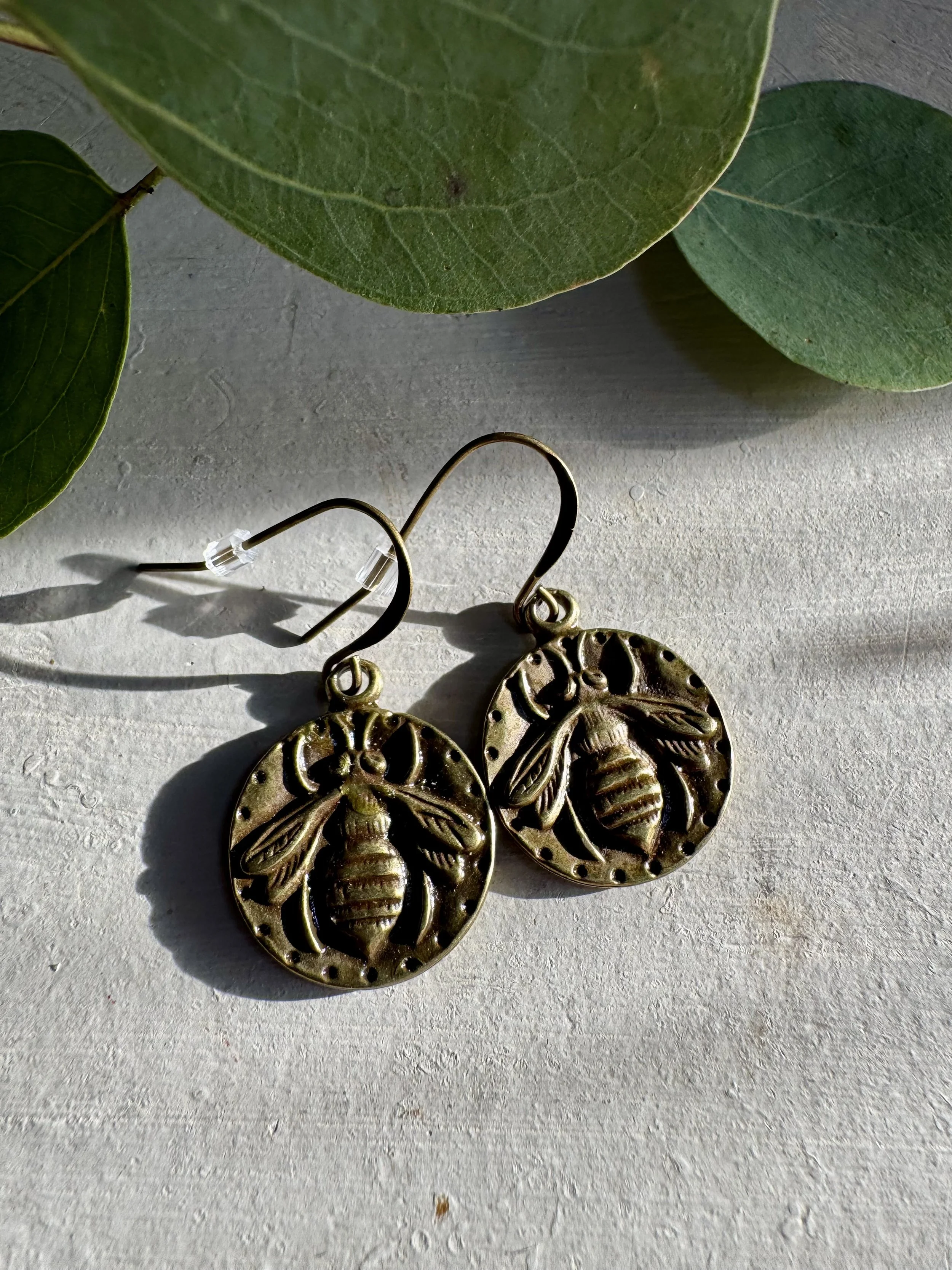 Bronzed Bee Earrings, $28