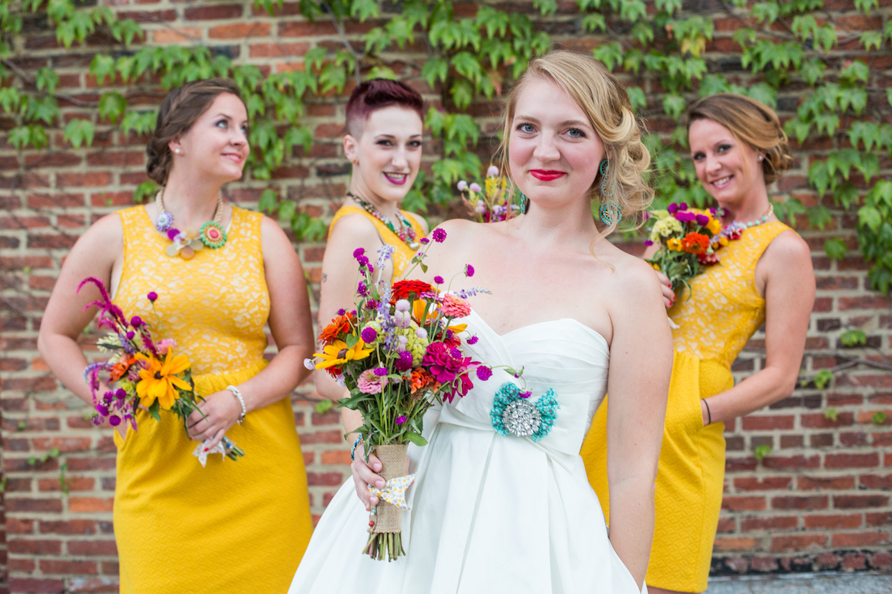 Bride with bridesmaids in yellow dresses