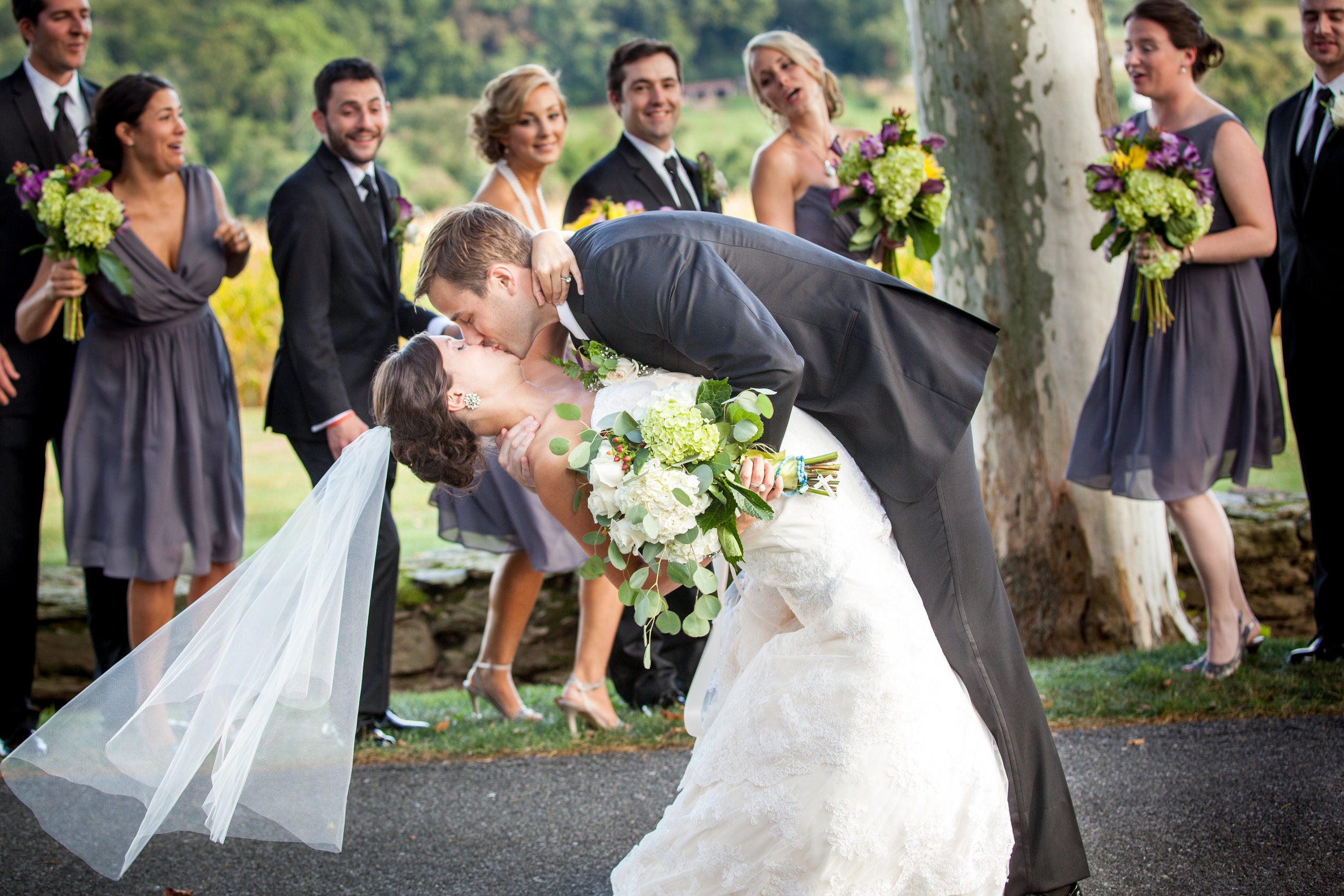 Bride &amp; groom kissing