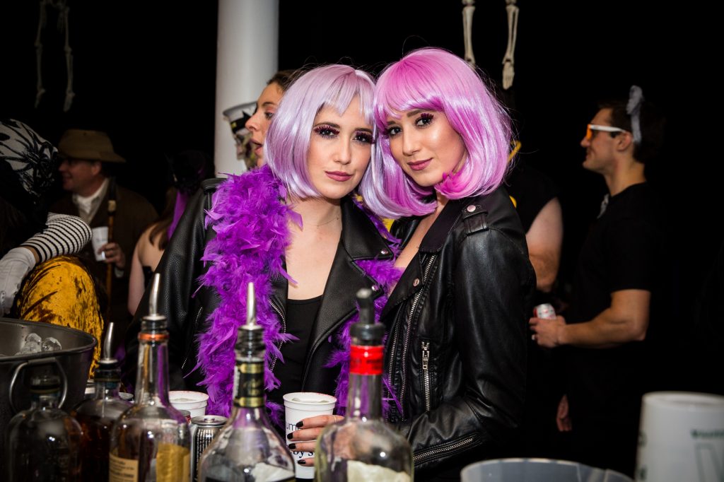 Two women with pink hair