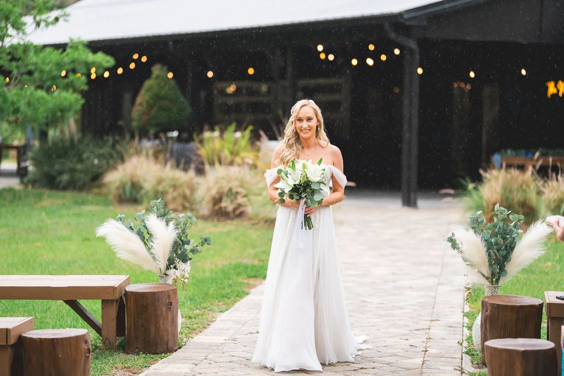 Bride walking down the aisle in Florida rain