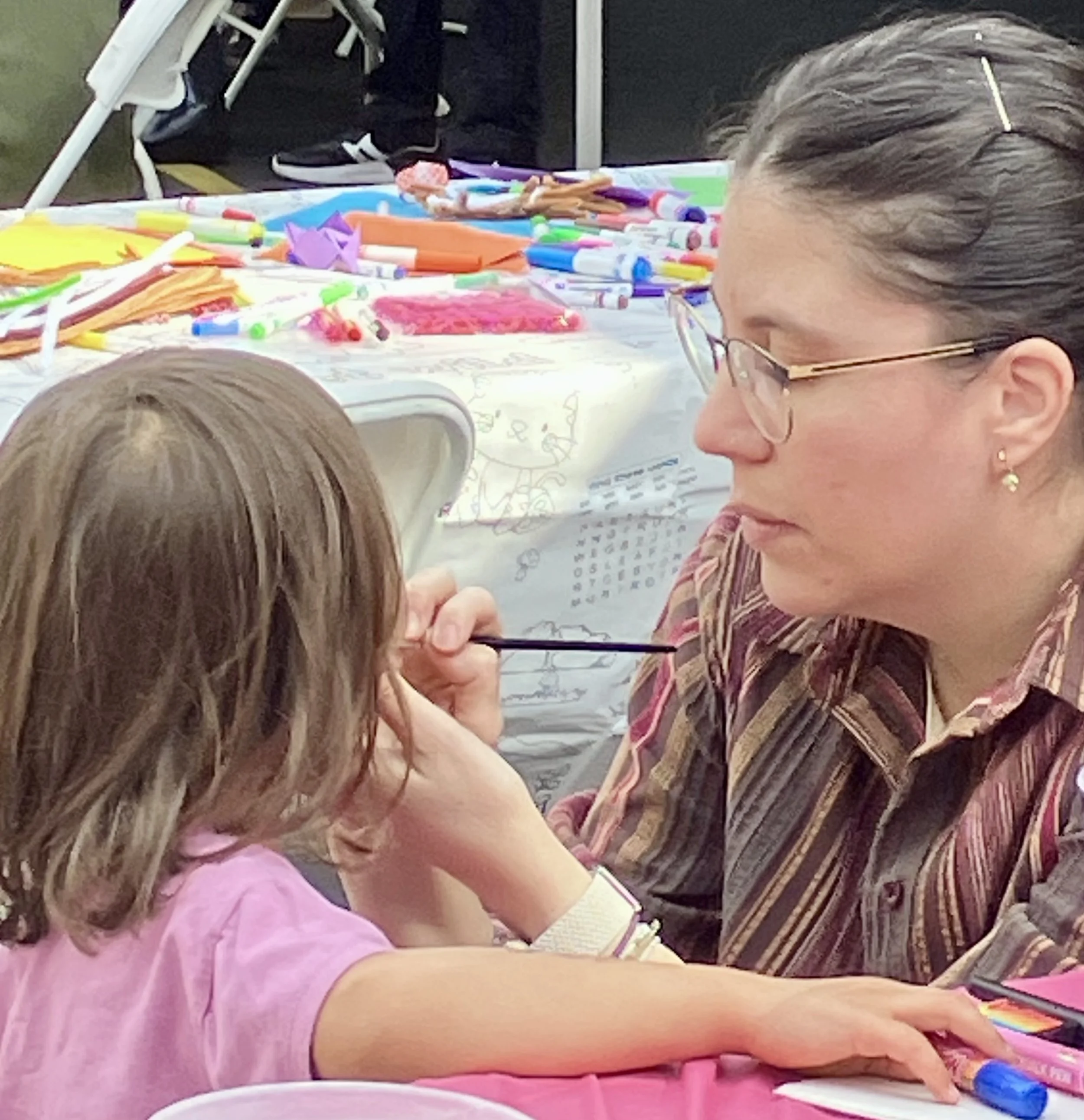 Face painting at Word Vancouver 2025.