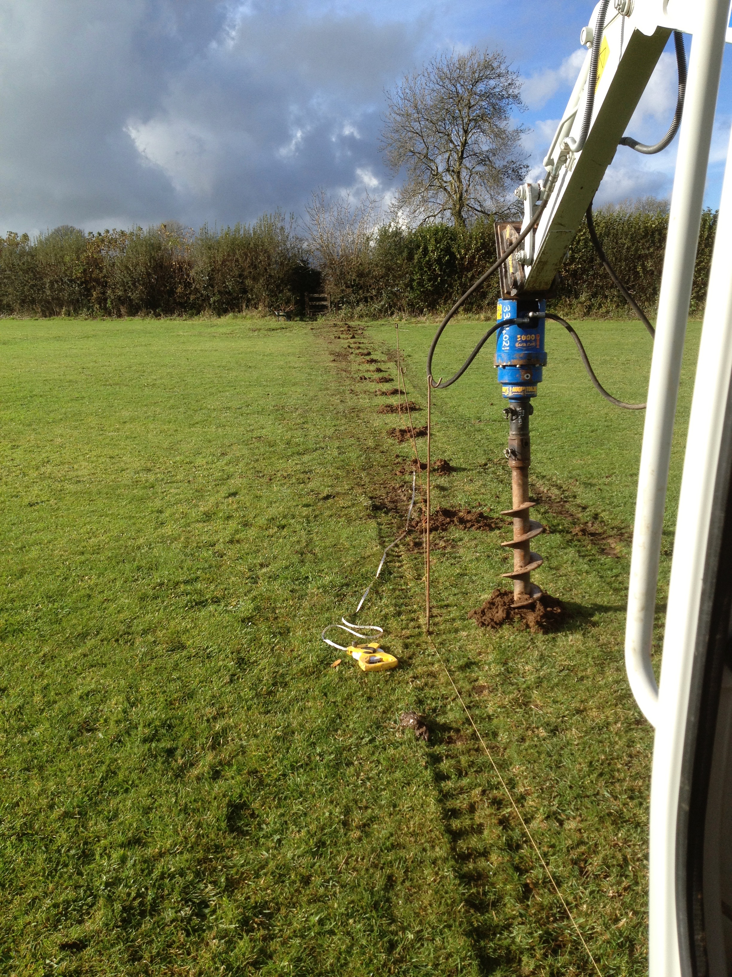 With lovely soft ground, an excavator-mounted post auger makes short work of the post holes for the fencing.
