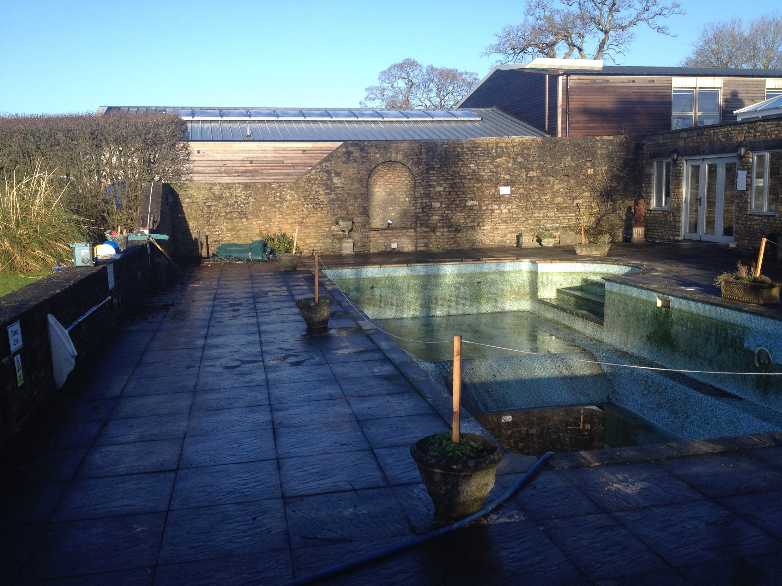 Quite a change from the start point. This fantastically positioned B&B had fantastic facilities, wonderful views and then a grotty old swimming pool stuck in the middle! Green & Gorgeous was asked to turn this into a Japanese-inspired Zen gravel garden. A project was born .....