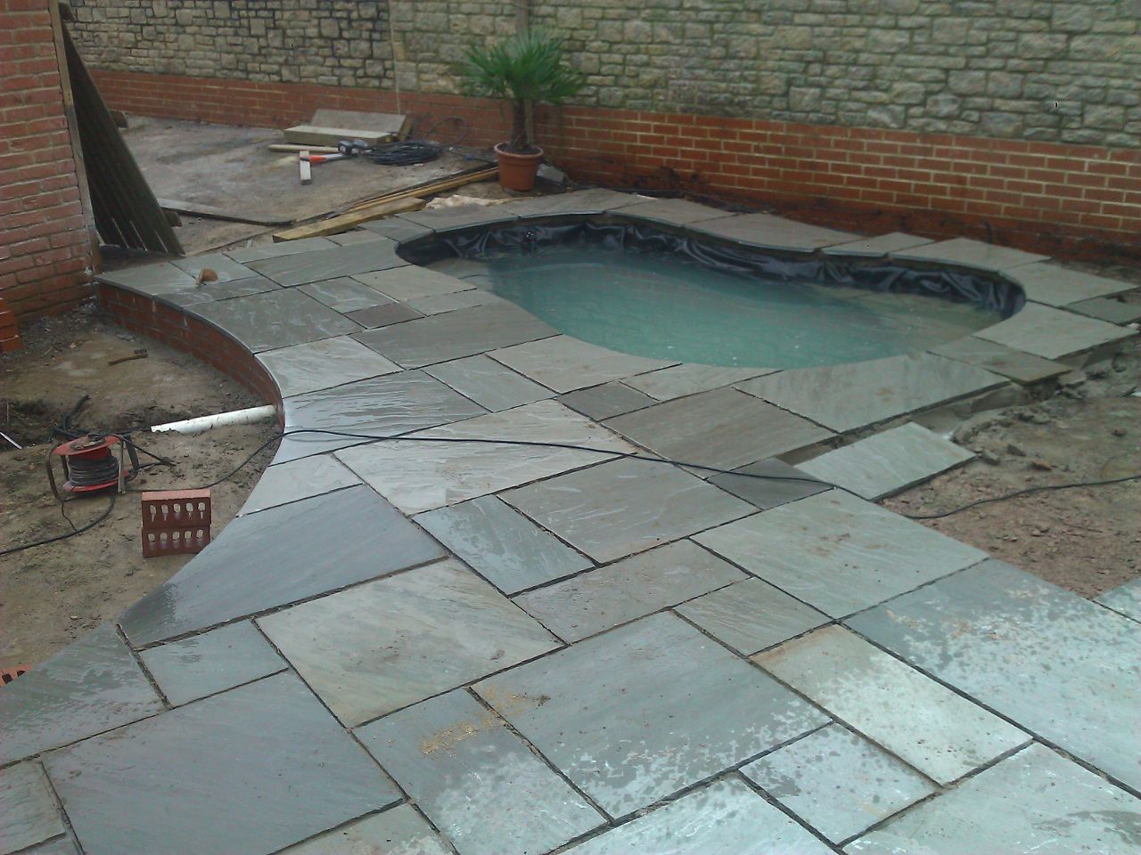 Sinuous curves were required for this pond. Not an easy thing to achieve, but the skilled landscapers at Green & Gorgeous made short work of it.