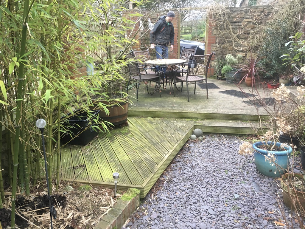 Image 6 Before: The space consisted of a tired and slippery decking area. Dangerous and uninspiring.