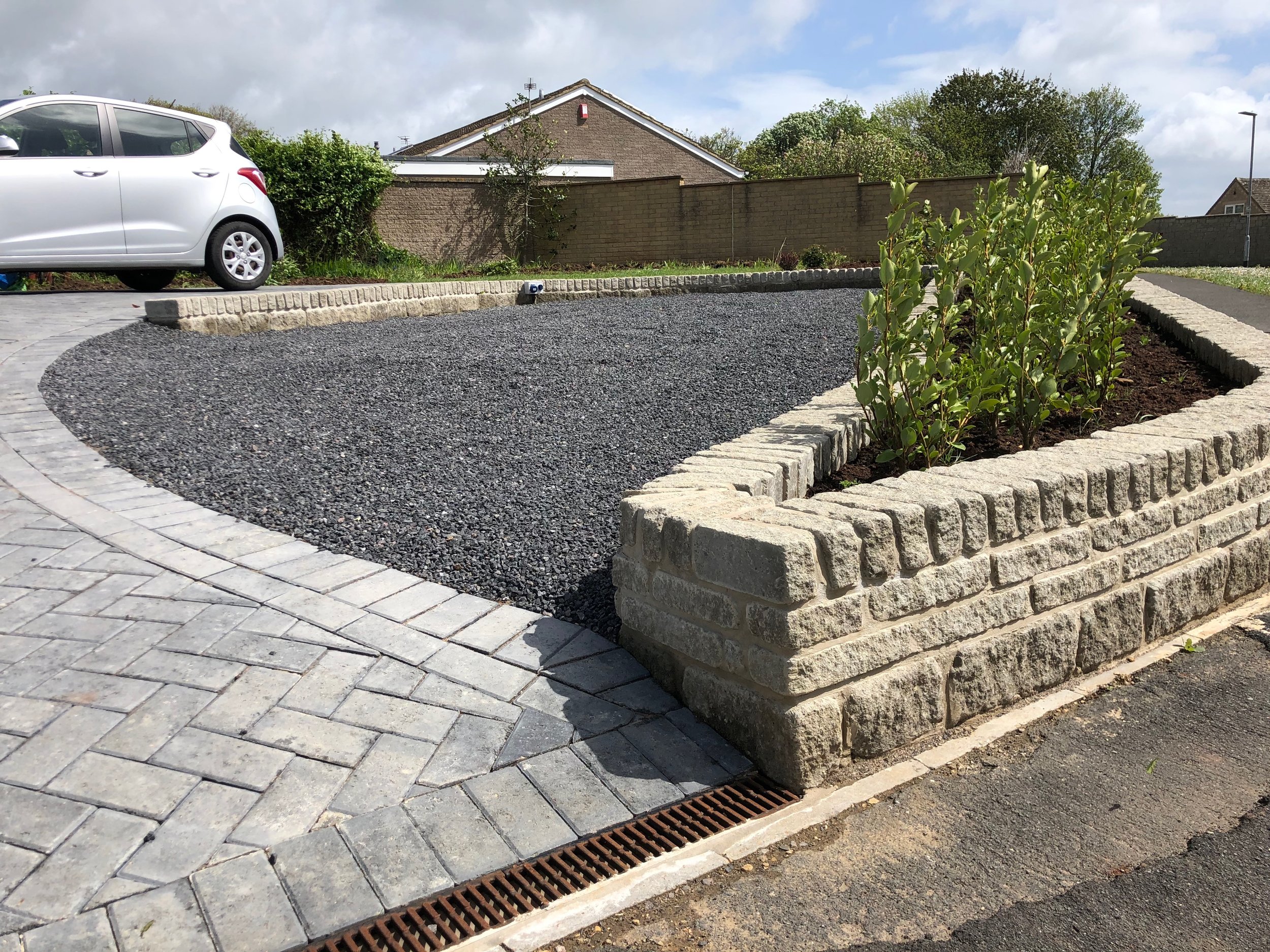 The plot had a steep gradient from road to house, and we needed to adjust the slope in order to prevent cars grounding-out when towing the caravan. A full site survey gave us the measurements needed to plan this well in advance.