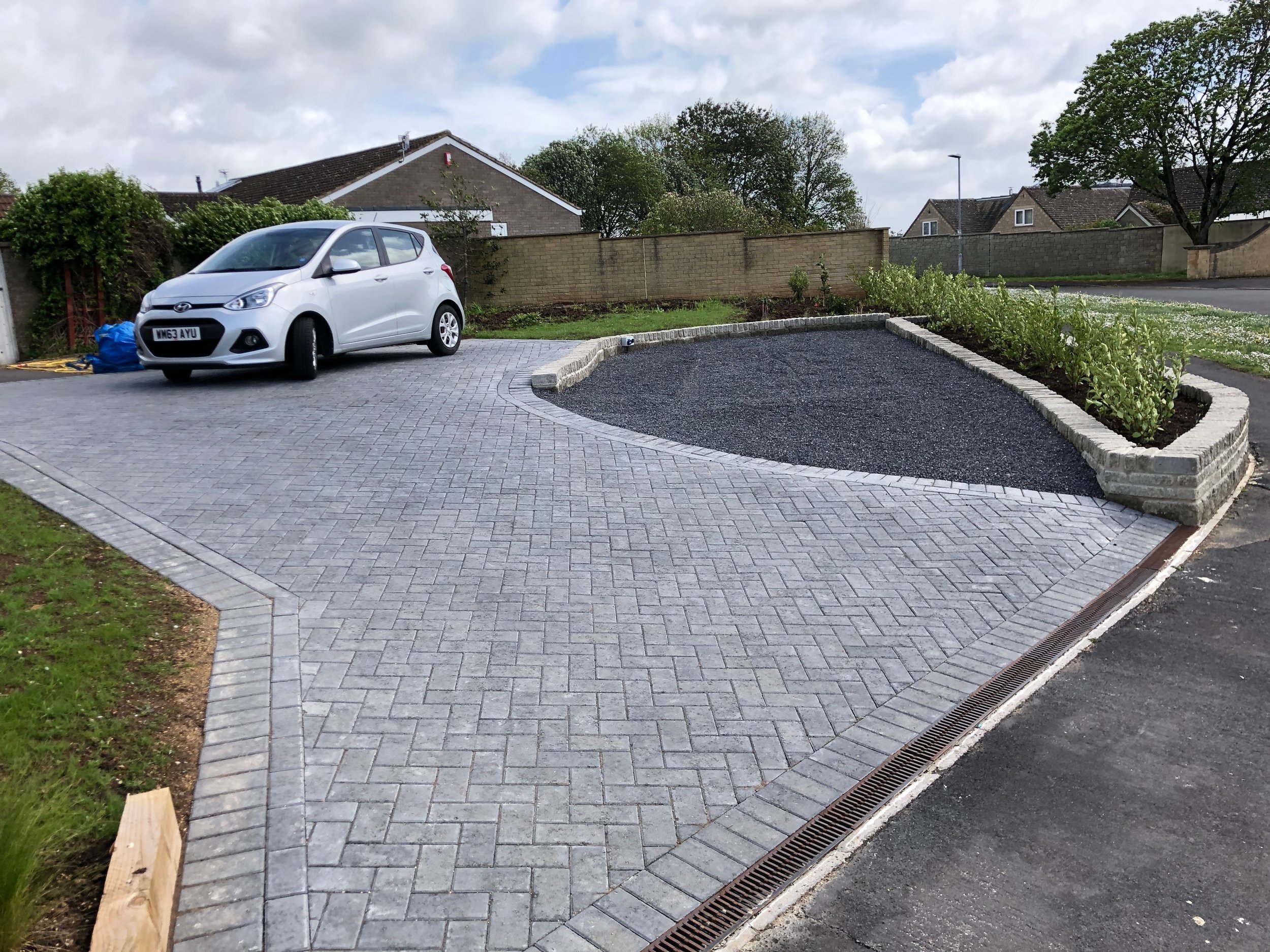 The caravan parking area is laid to aggregate to reduce cost, with plenty of parking space remaining on the rest of the drive.