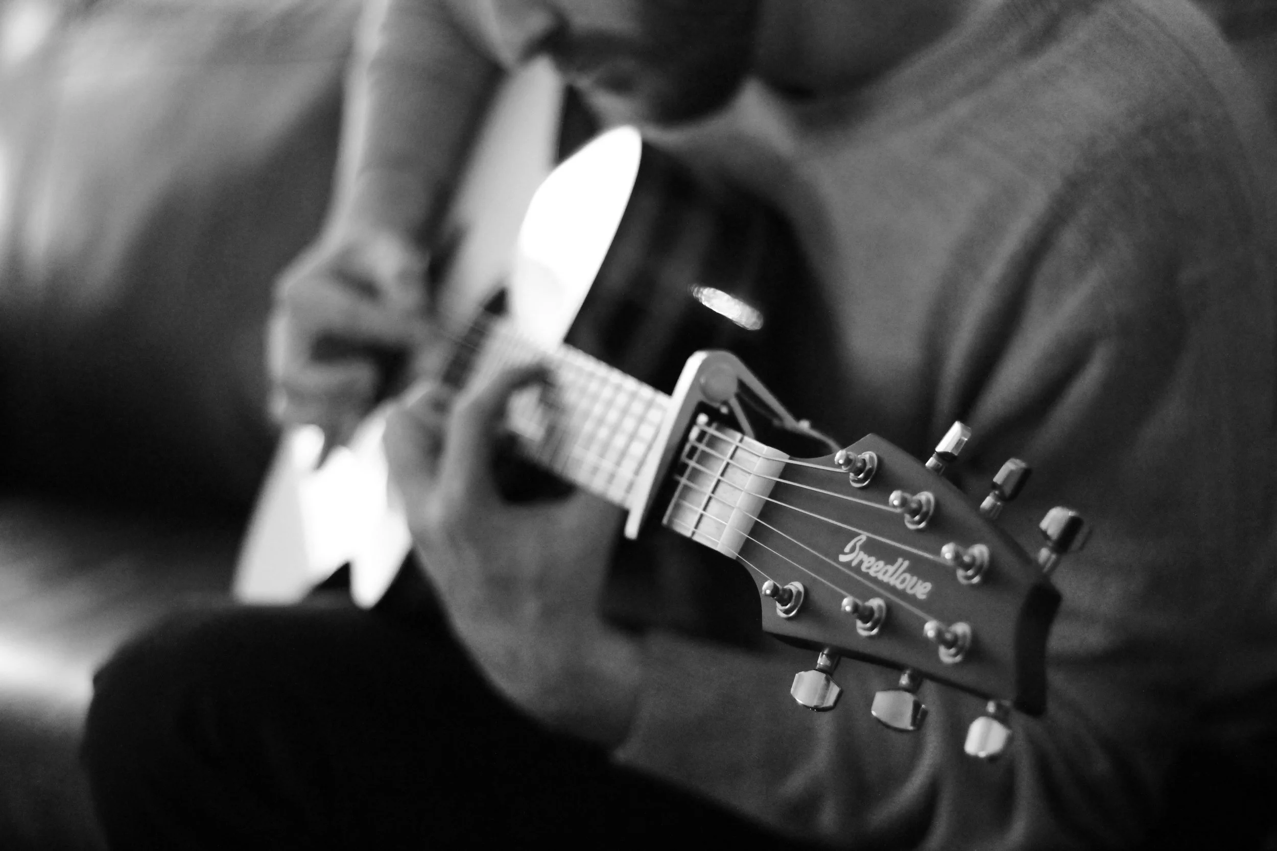Indy loves playing the guitar. He plays the guitar with his soul.