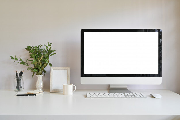 workspace-computer-photo-frame-coffee-with-plant-decoration-office-desk_35674-941.jpg