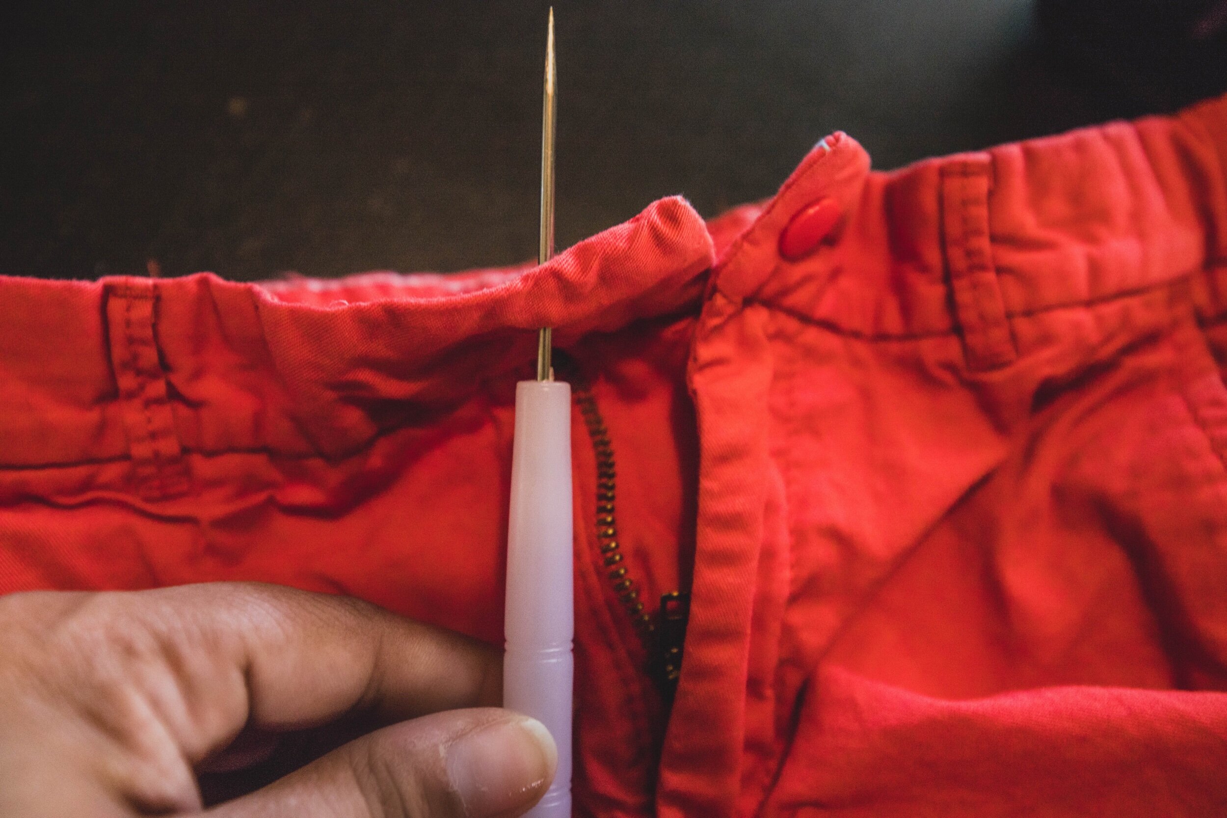 for fabric that doesn’t have a opening in it, you can make with with this tool that comes with your snap kit.