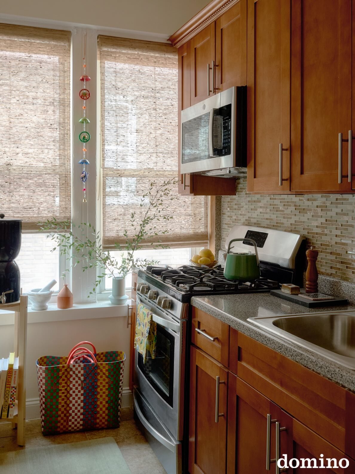 Kitchens and bathrooms are where my rituals live. Warm water and lemon first thing. Palo santo burning low. Dry brushing before the shower, magnesium salts poured generously into the bath.

In the kitchen, a kettle or dutchy sits on the stove; there&