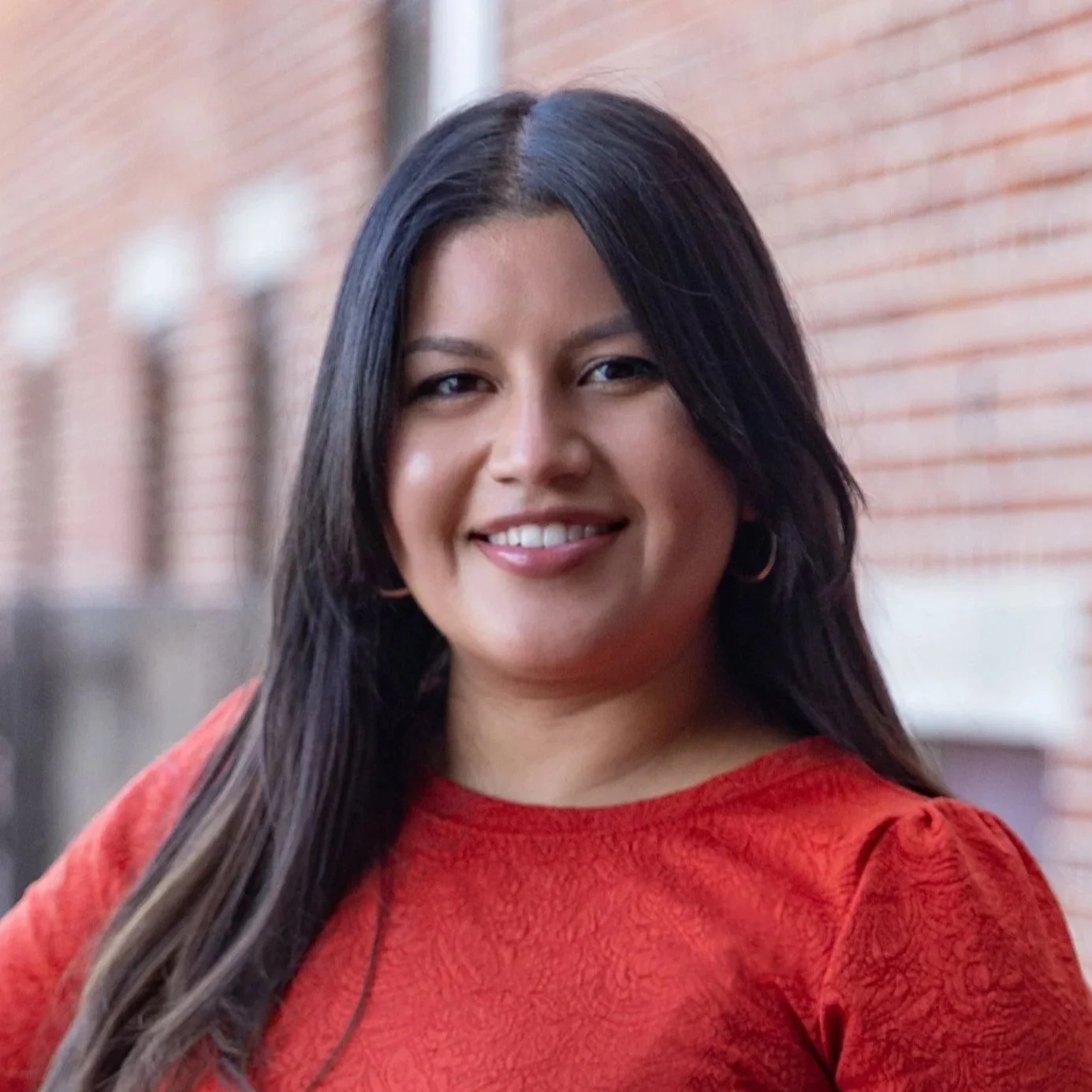 headshot of Marialuisa Meza-Burgos