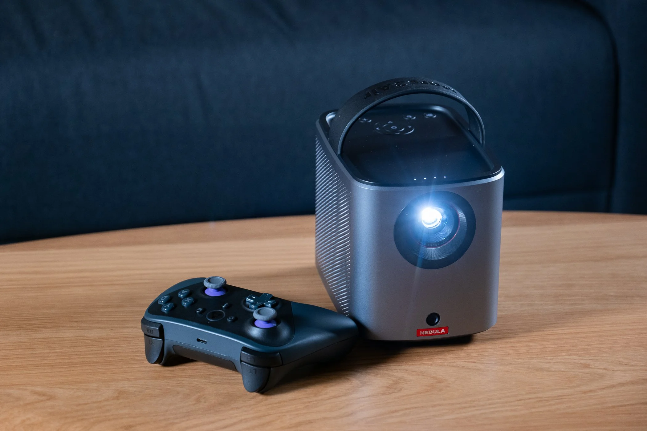 Nebula Mars Air 3 powered on next to game controller.jpg
