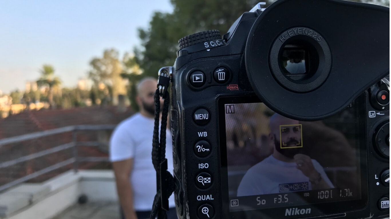 Hasan in front of camera.jpg