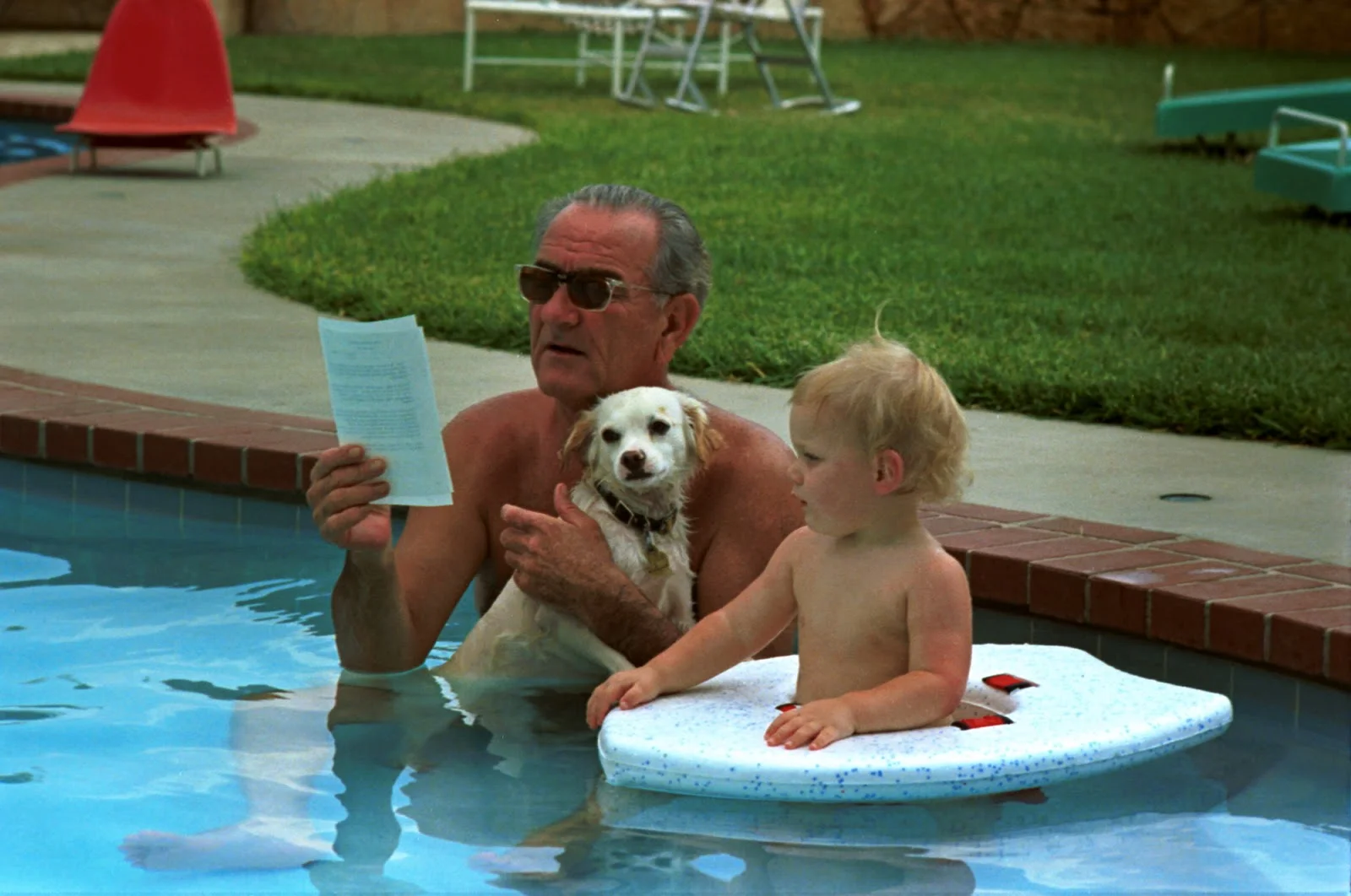 President Johnson with grandson Patrick and dog Yuki on his 59th birthday. LBJ Library photo by Yoichi Okamoto, Aug. 27, 1968
