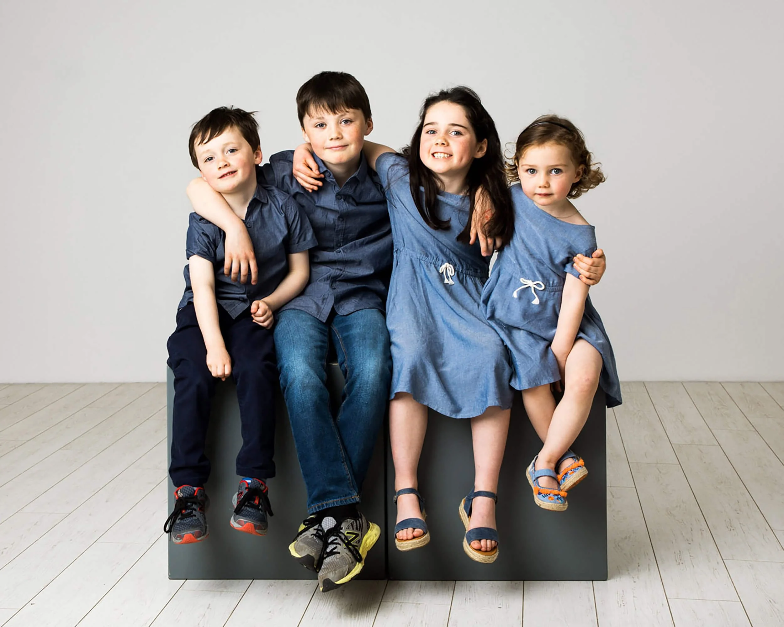 Young-Broithers-and-Sisters-Blue-Demin-Together-Studio-Portrait.JPG
