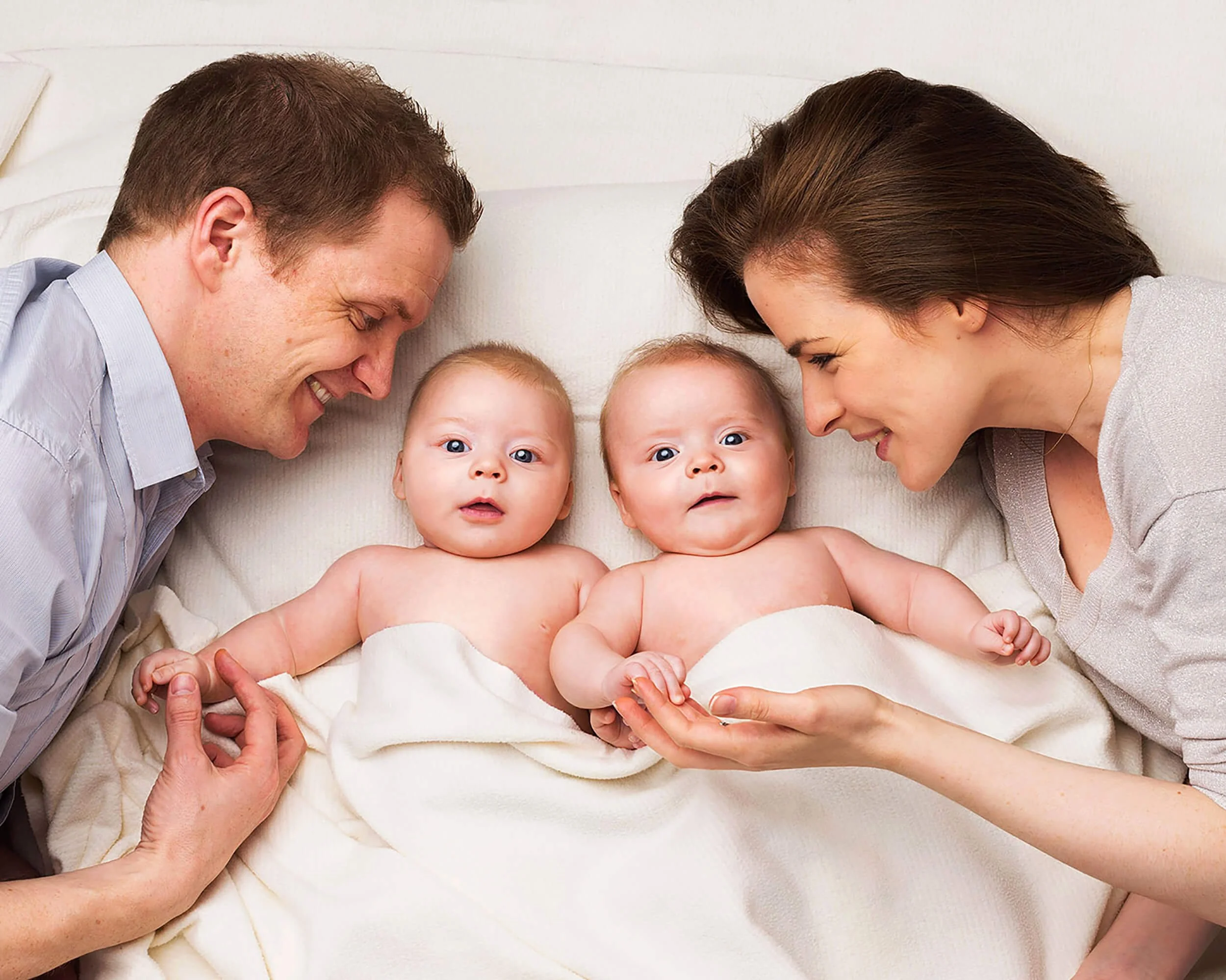 Twins-with-parents.JPG