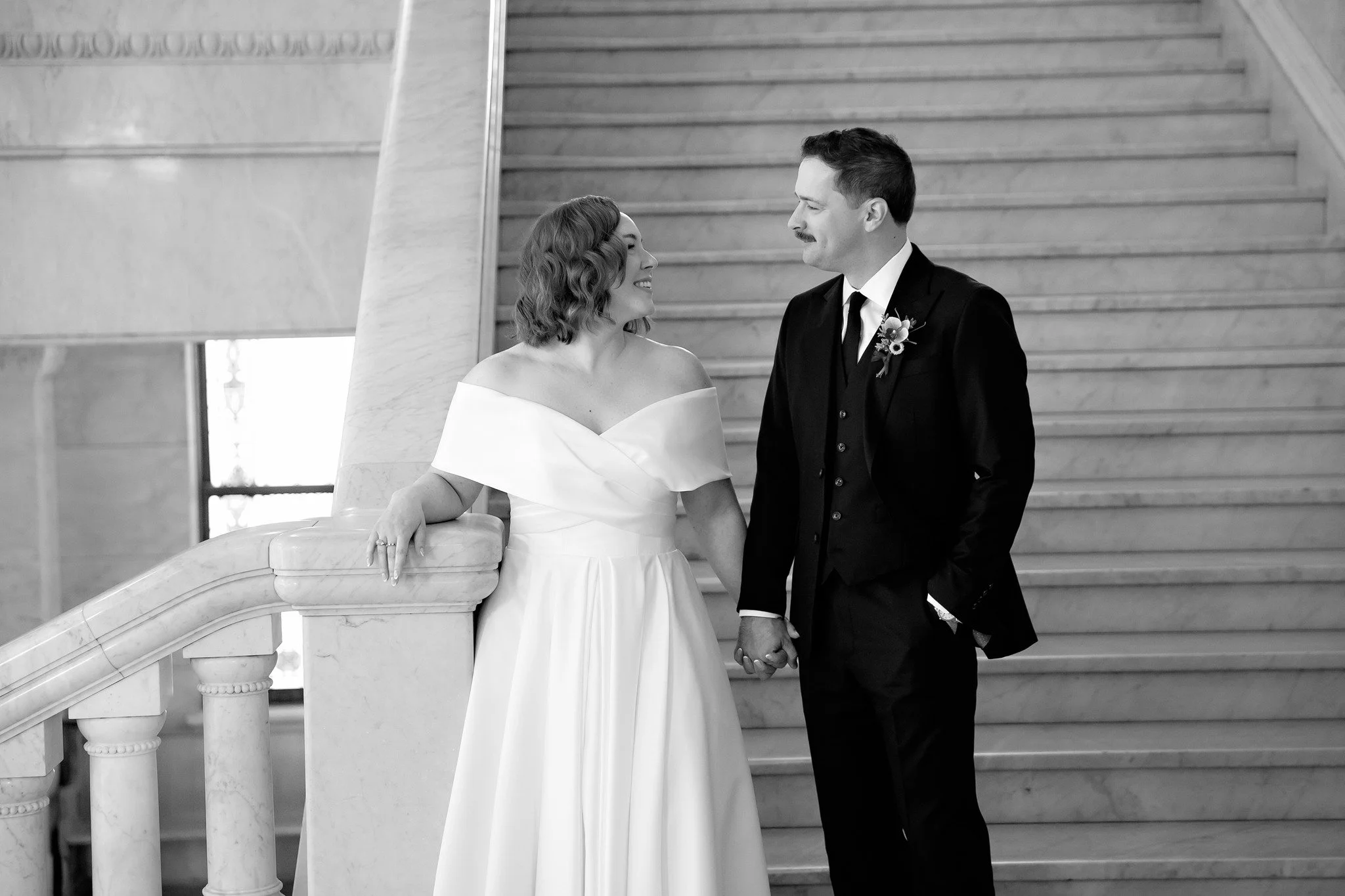 Caught in a moment that feels like forever. ✨ These two brought all the romance, all the joy, and all the heart eyes to their wedding day&mdash;and one of my best gals, no less. 🖤

Love like this never goes out of style. 

#MinneapolisWeddingPhotogr