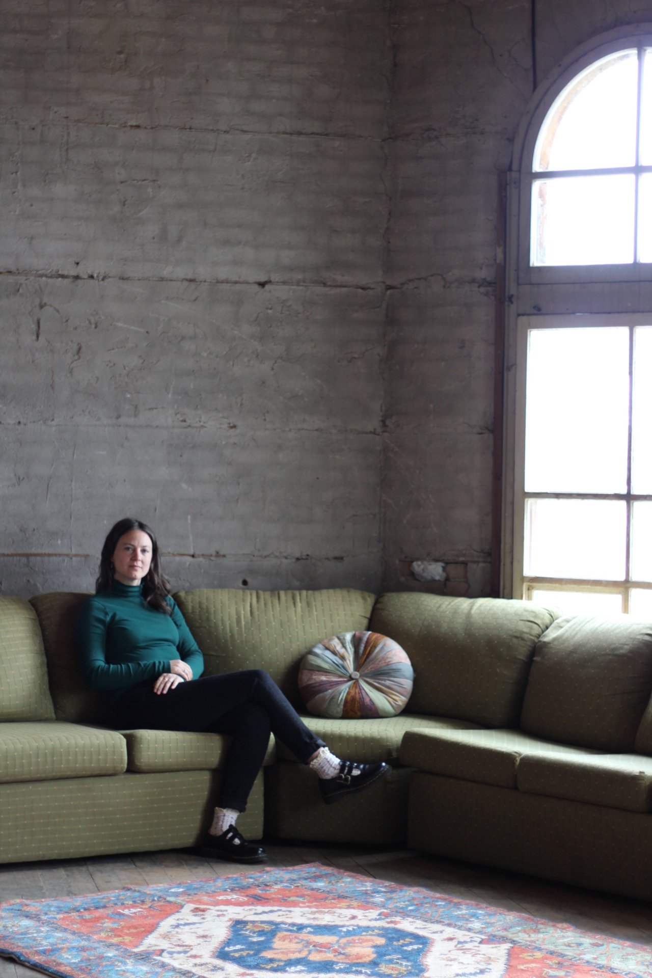 Alexis, lone on couch.jpeg