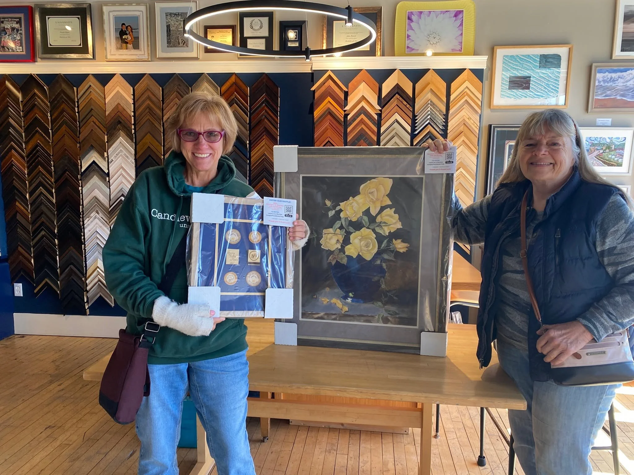 Just two very satisfied customers showing off their finished pieces! Seeing our customers smiling faces is one of our favorite parts of the job. We love knowing that we helped preserve peoples important memories. Our community is everything to us, an