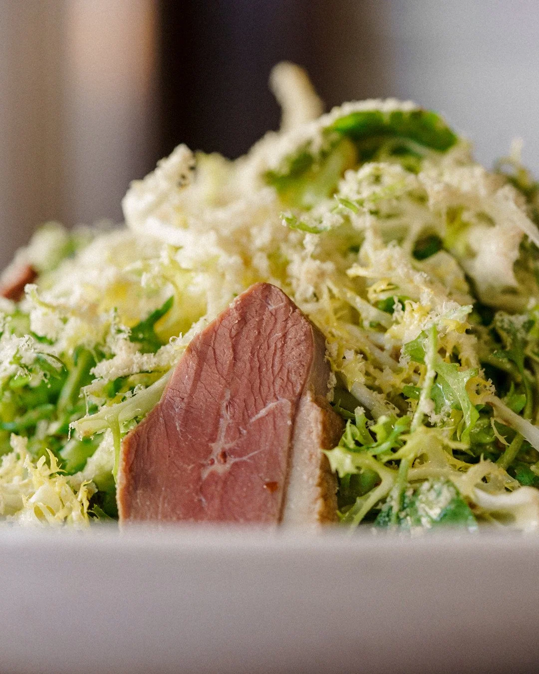 Some zoomed in close-ups of the salade p&eacute;rigourdine -- confit duck gizzard, smoked duck ham, fris&eacute;e &amp; watercress, celeriac, shaved foie gras, red wine jus.⁠
⁠
Our lunch time staple -- served during weekdays between 11:30 am and 5 pm