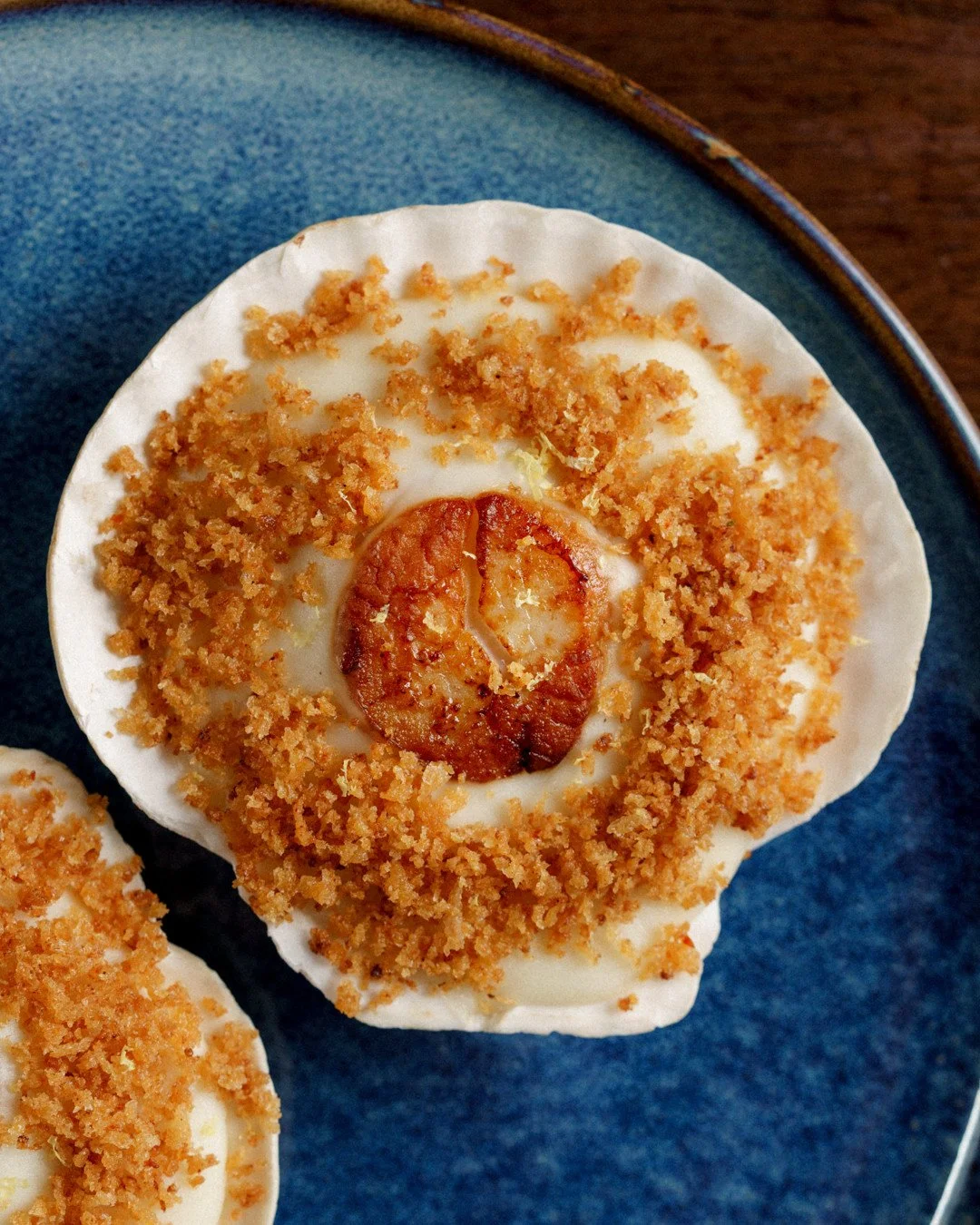 Coquilles St Jacques | Hokkaido scallop, b&eacute;chamel, mushroom, chili crumb⁠
⁠
Hokkaido scallops come from the icy waters off Japan's northernmost island, where the cold temperatures create that explosive sweetness and buttery texture they're kno