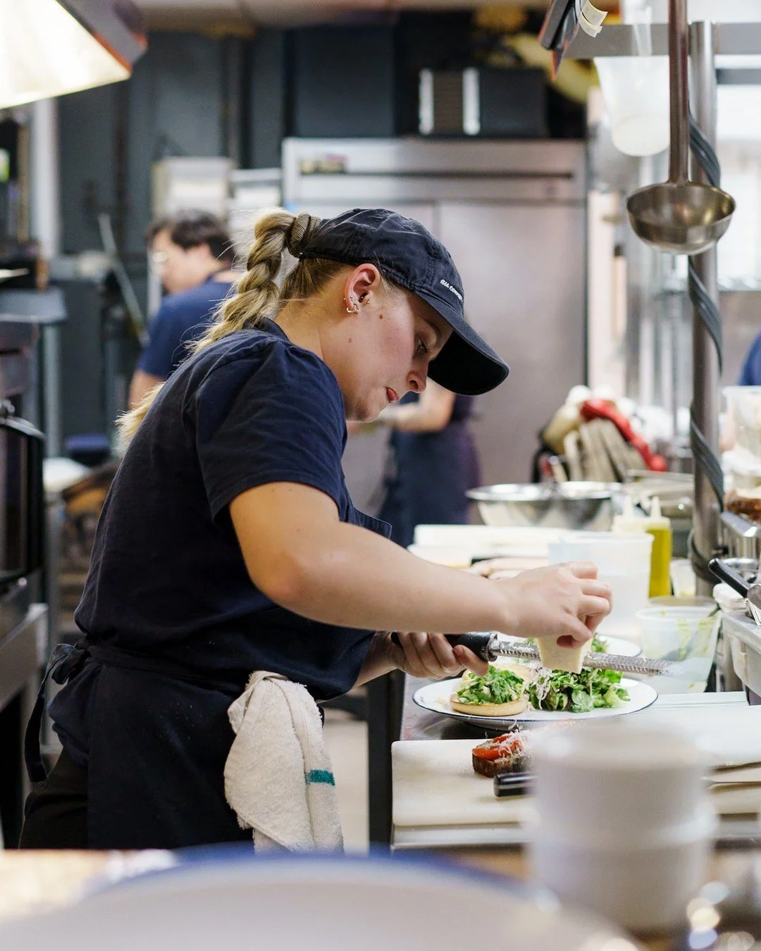The view from expo during a packed lunch service. Orders coming in, plates going out, everyone locked in.⁠
⠀⁠
#AuComptoir #Kits #West4th #BehindTheLine