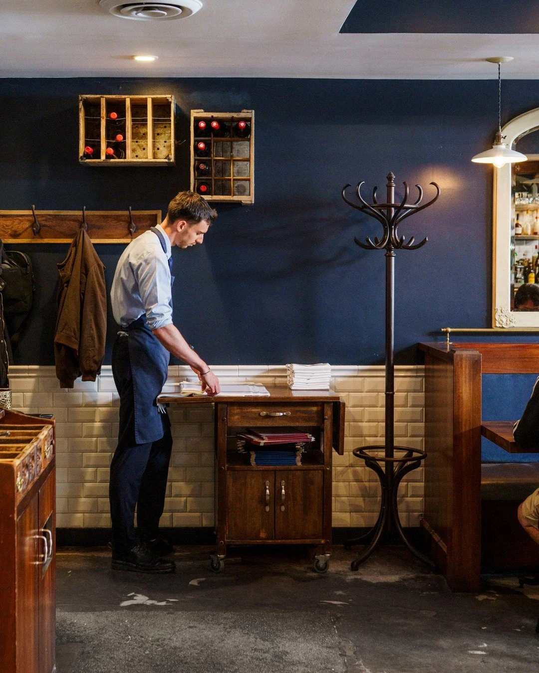 The small tasks that keep service running. Folding linens between courses, resetting tables as guests leave, making sure everything's ready before the next seating.⁠
⁠
It's the rhythm of the dining room. Come by this weekend and see it for yourself.⁠