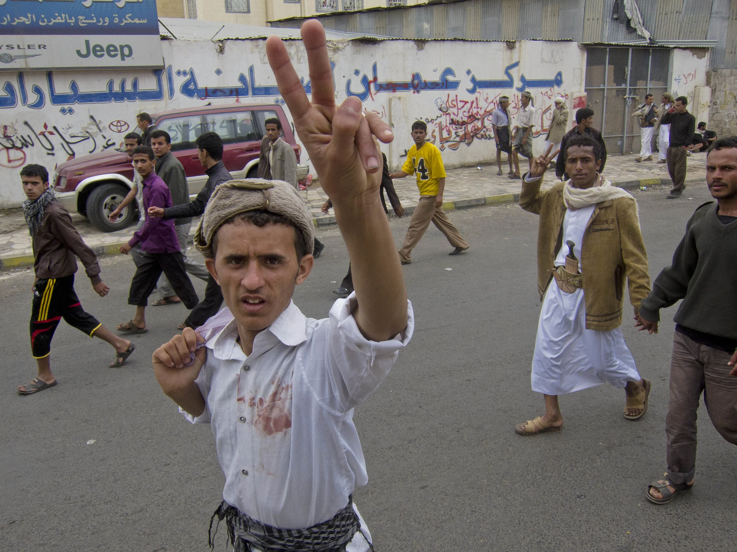Government Forces in Sana'a open fire one day after Saleh's sign