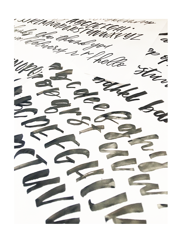 Every character was written by hand using a folded pen and sumi ink. Some characters were written several times before choosing which version would make it to the final character list.