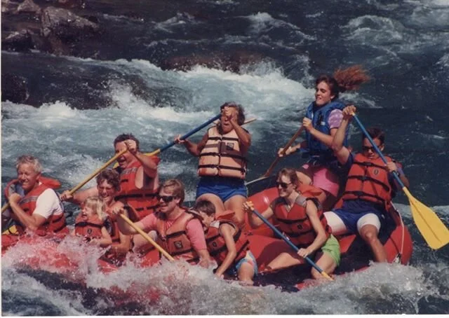 today's throwback thursday post comes with a slight challenge. Can you spot 4-year-old emme living her best life in the front of this raft somewhere near GLAC (glacier national park)? If you know her now, you know she still makes that face when she's
