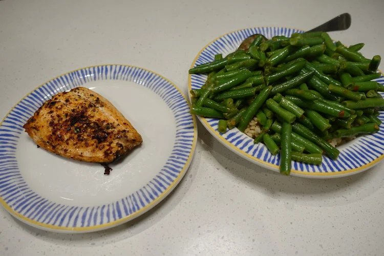A typical lunch or dinner. The total food weight is around 1kg, made up of rice, vegetables and 150g of meat, in this case, oven baked salmon.