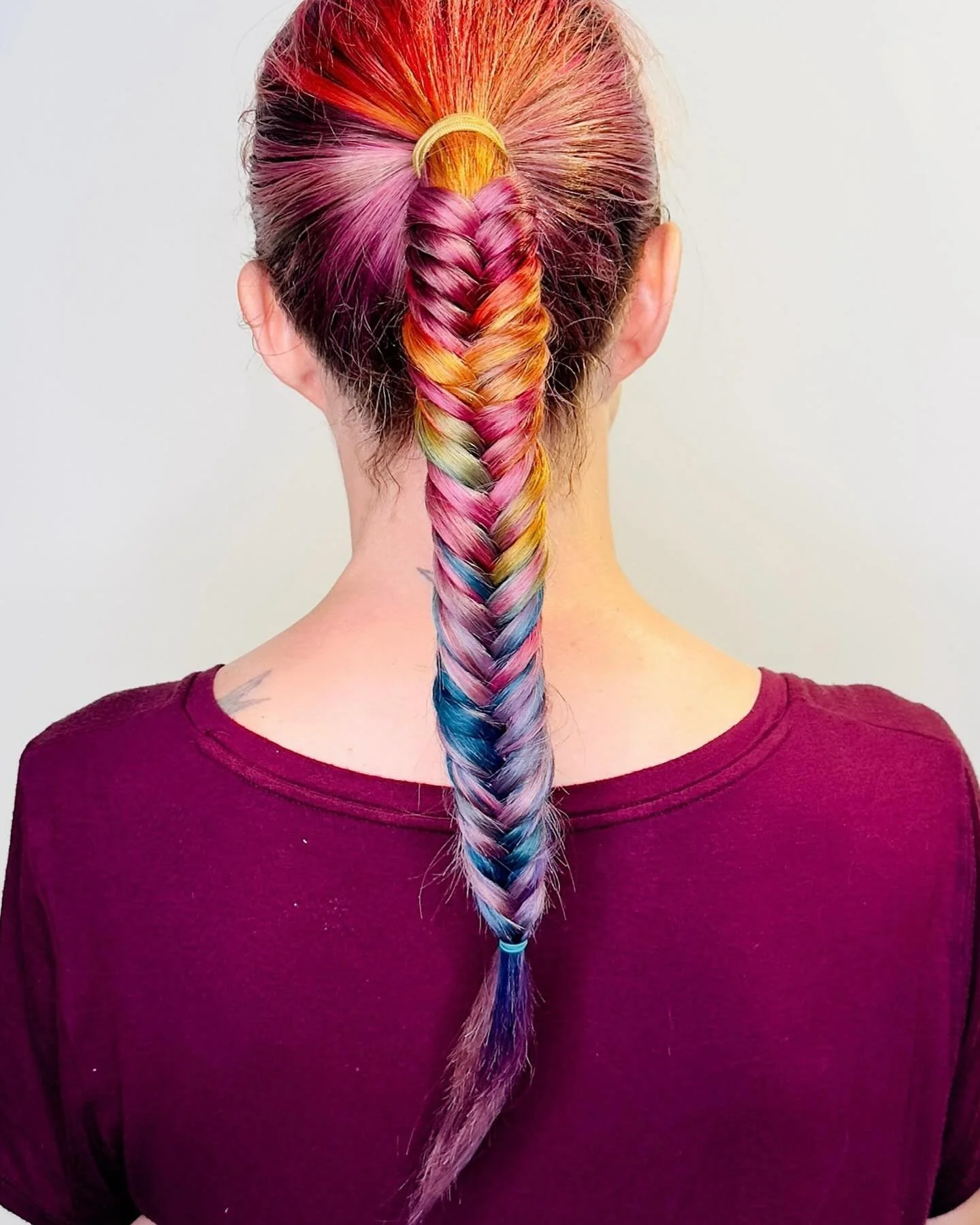 Fishtail rainbow braid &mdash; love it! Coloring by Kayla, braiding by Denise, worn by Nevis #braiding #fashioncolors #colorspecialist