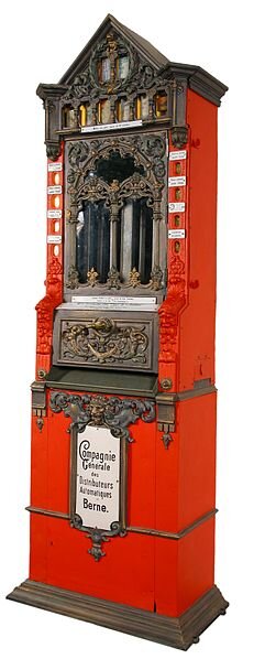Diät? Vergessen Sie’s! Wer an diesem “Merkur“-Automaten keine Stollwerck-Schokolade zieht, muss verrückt sein.  Bildquelle: Vwendeler, CC BY 3.0, Wikicommons