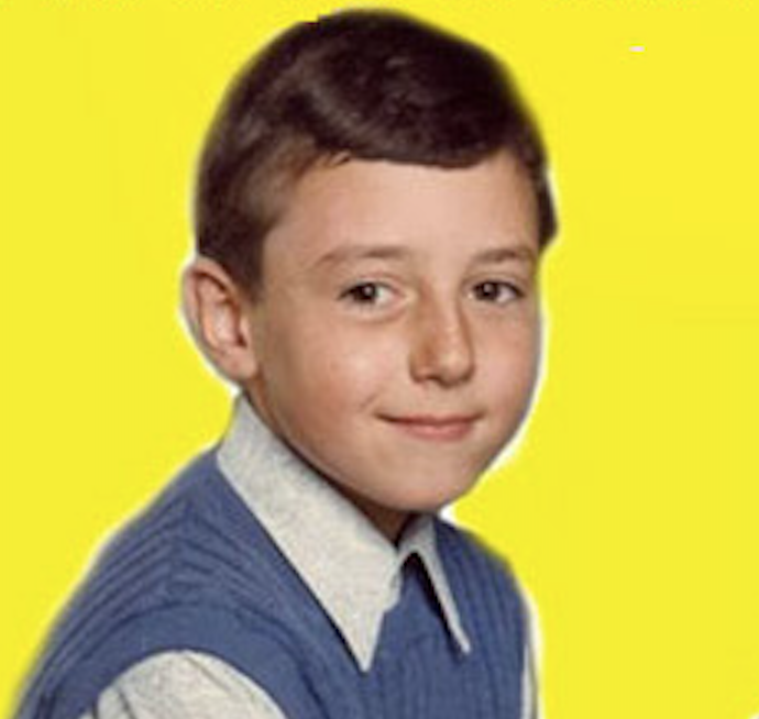 Me aged 7 with rather straight looking hair from a barber haircut.