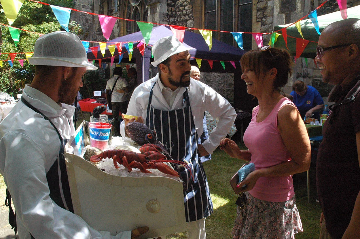 A world picnic for the whole community included live music and livelier seafood puppets in Christ Church garden.