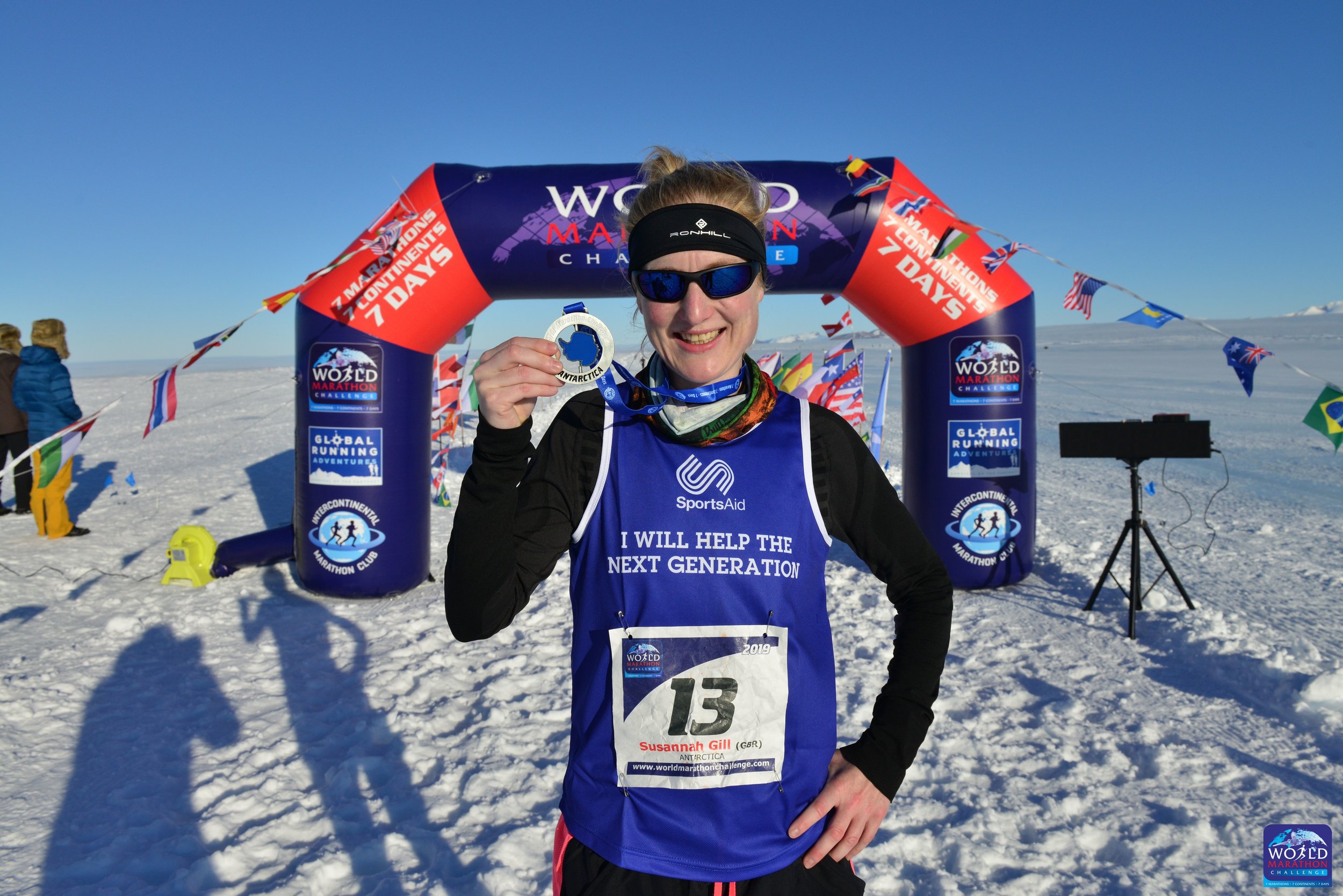 Susannah Gill wiht medal in Antarctica .jpg