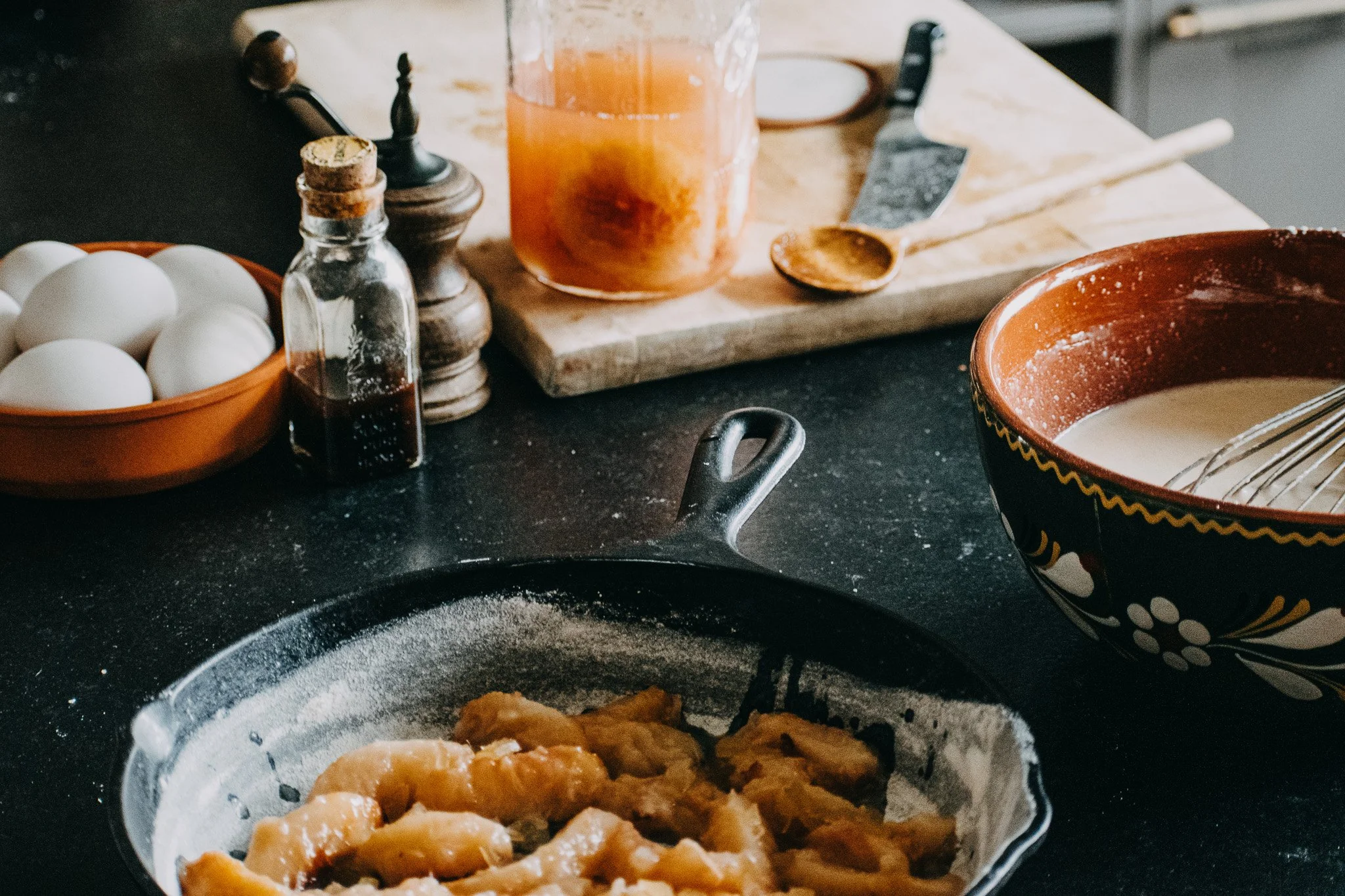 Lodge cast iron frying plan with French baking recipe clafoutis peaches custard