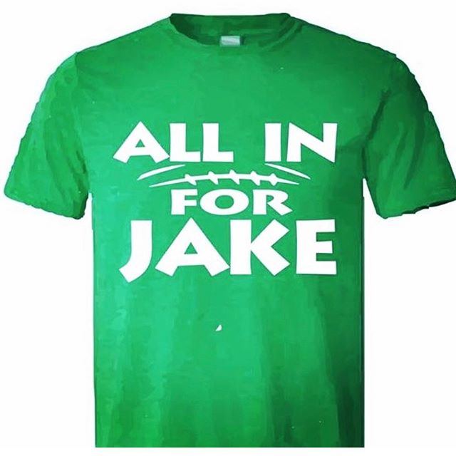 Repost from @andersontrojanfootball. Sending love, hugs and prayers to Jake and the entire Hays community. #morethanagame 💛💙💚 ————-
“Trojan Nation - Jake Jackson is a Hays football team member who is battling bone cancer - their fans will be wearing this shirt in support of his journey as our game tomorrow will be his last game on the sidelines. While we will still be in our BLACKOUT shirts, cheerleaders, band, and belles will be showing support for Jake by adding a touch of green to the stands or their uniforms - we will also have green balloons in support of Jake - Trojans, let's be ALL IN for JAKE!!!”