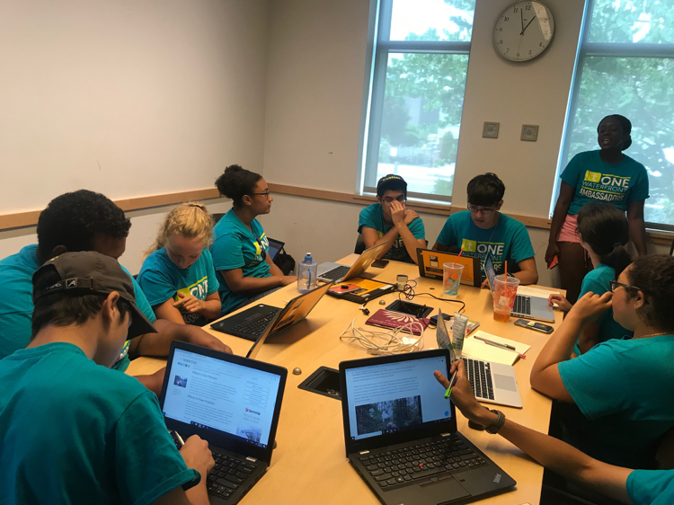 Hard at work on their posters. Come check them out at our Community Event on Thursday, August 15th at Our Garden in East Boston.png