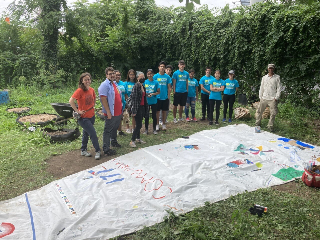  On Monday, we went to the Secret Garden, part of Eastie Farm. Although it was muddy, we did a lot of hard work and painted to share a message with the public about climate change, greenhouse gases, and air pollution. ~Nailyn 