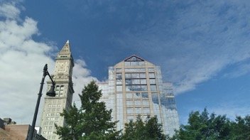 Very relaxing shot of the clouds and glass of the buildings -   Cloudy Business.jpg